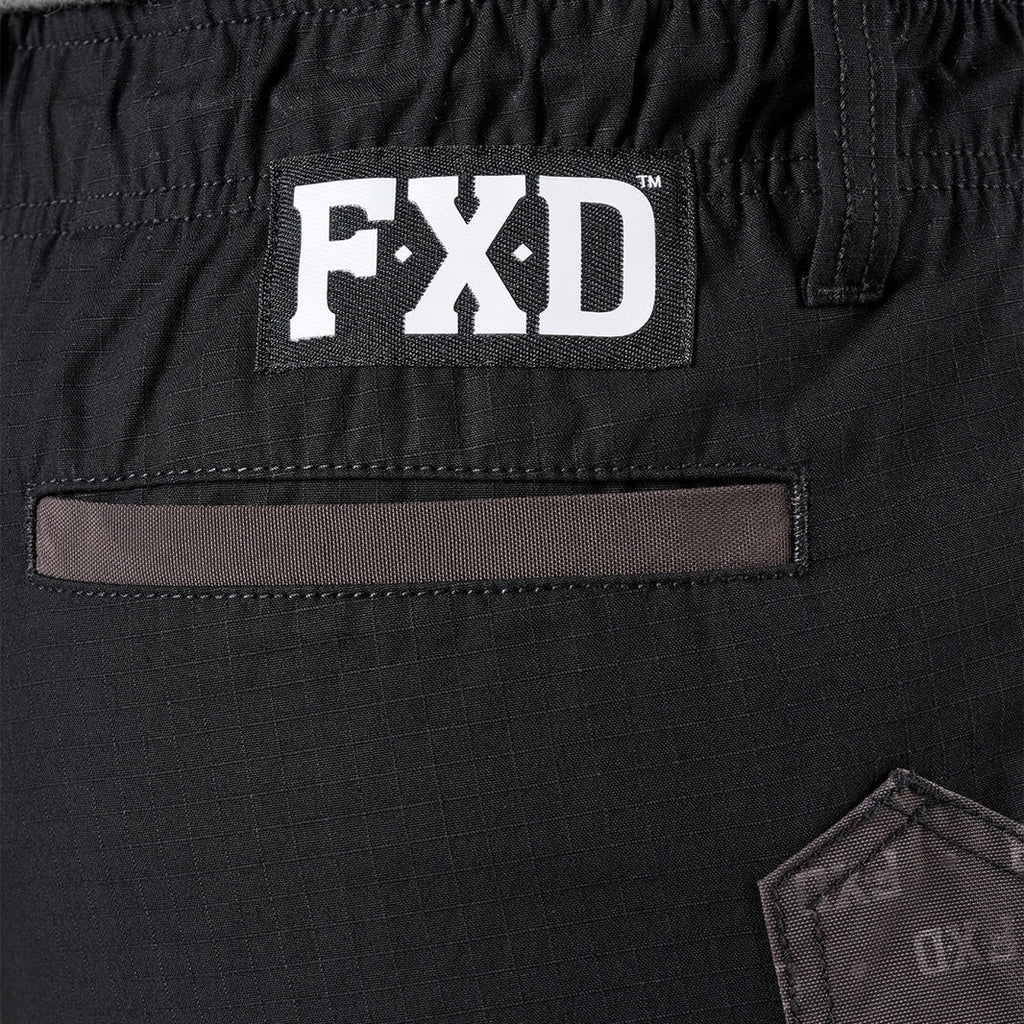 Close-up of black FXD Men's WS-7 Work Shorts (FX02306022) showing waist band and pocket detail.