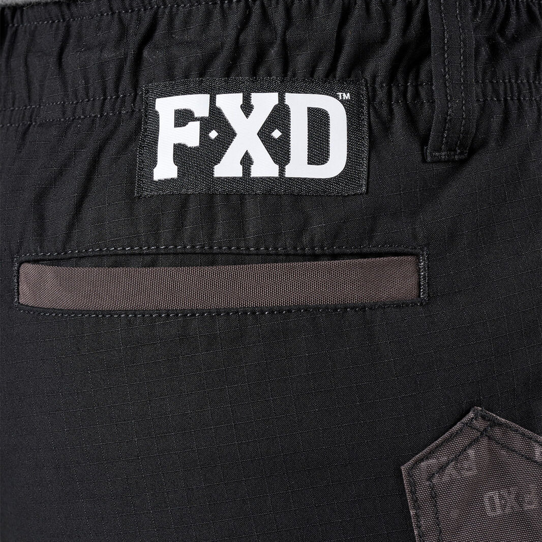 Close-up of black FXD Men's WS-7 Work Shorts (FX02306022) showing waist band and pocket detail.