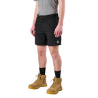 A man modelling black FXD Men's WS-7 Work Shorts (FX02306022) with a grey tee, black crew socks and wheat coloured boots on a white background.