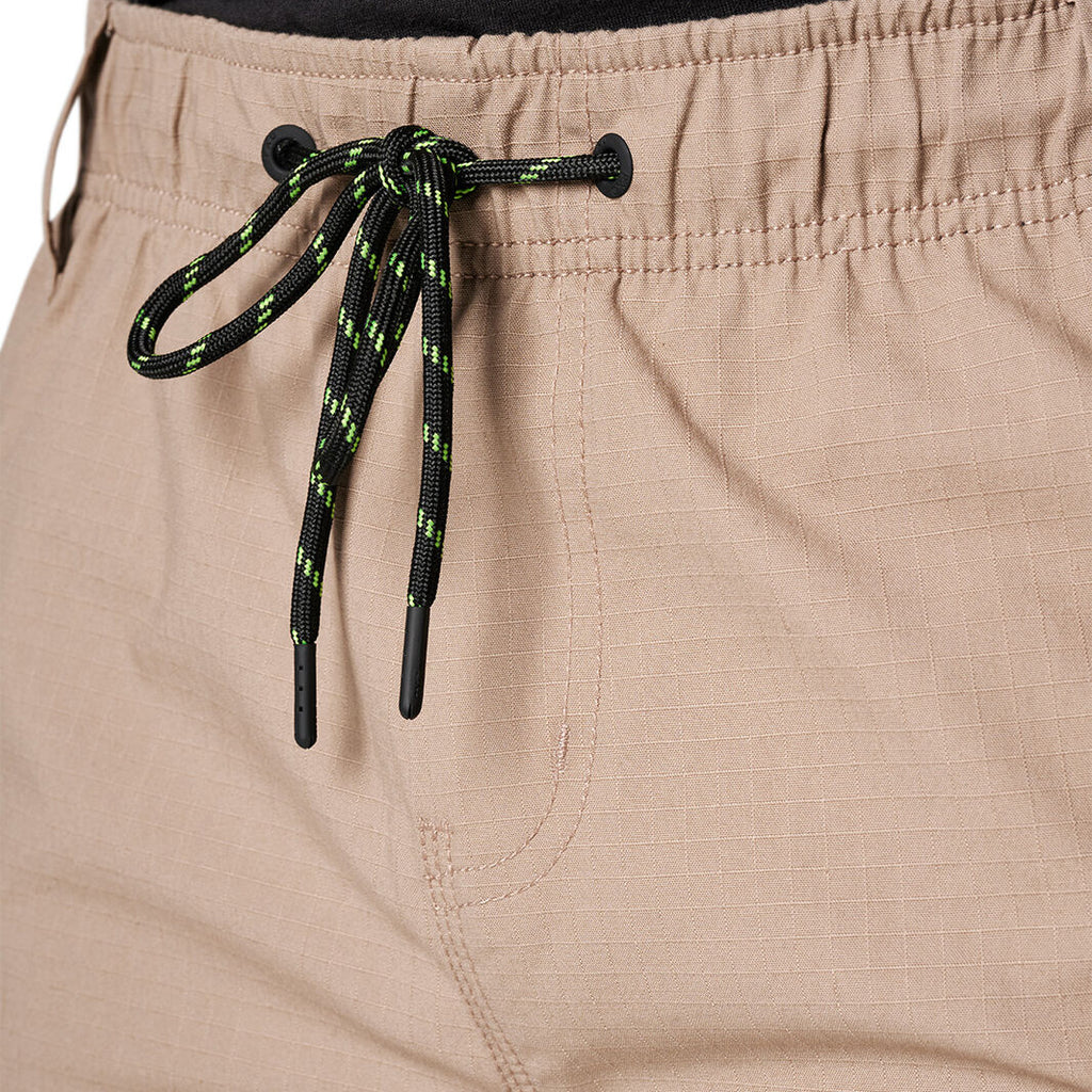 Close up of a pair of khaki FXD Men's WS-7 Work Shorts (FX02306022) showing the waist band and drawcord on a white background.