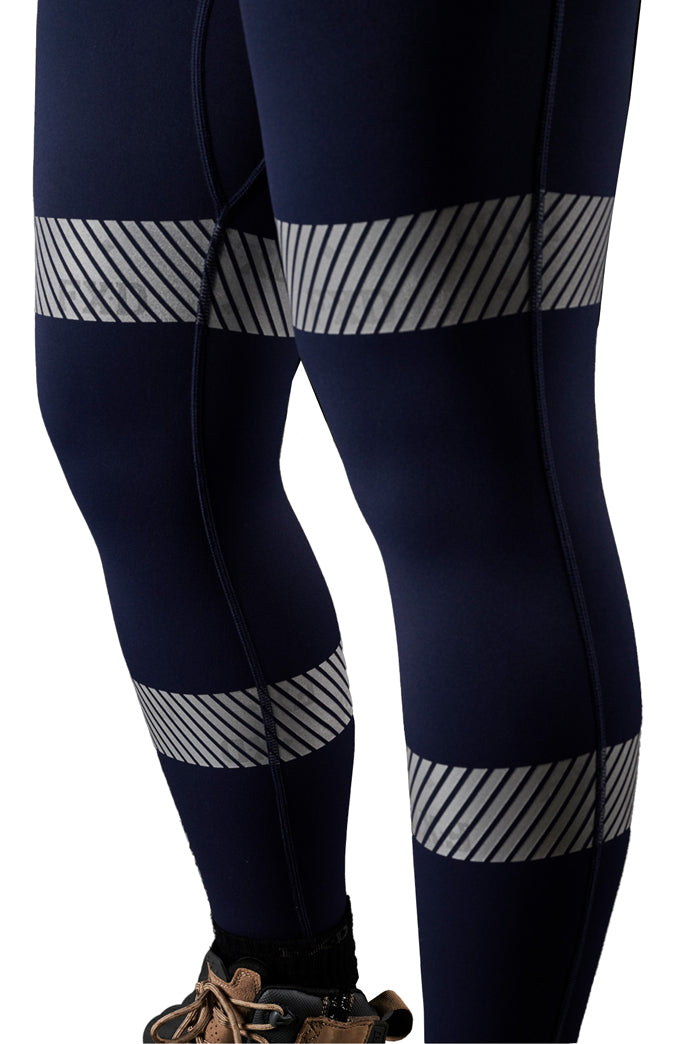 A close up view of the taping on a pair of navy FXD Women's Taped Work Leggings (WP-9WT) on a white background.