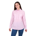 A woman wears the Hard Slog Womens Clara Half Button L/S Shirt in pink with blue jeans, smiling against a plain white background.
