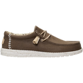 Hey Dude Mens Wally Stretch Canvas Slip On Shoes (40700-2LN) in Teak Brown feature an easy-on lace system, white stitching, cushioned ankle collar, patterned lining, and a white speckled sole. Shown on a plain background.
