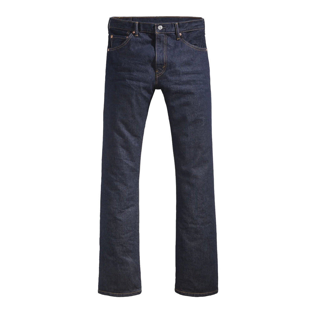 A flat lay of a pair of dark blue rinse Levi's Men's 517 Heritage Bootcut Jeans (00517-0216), against a solid white background.