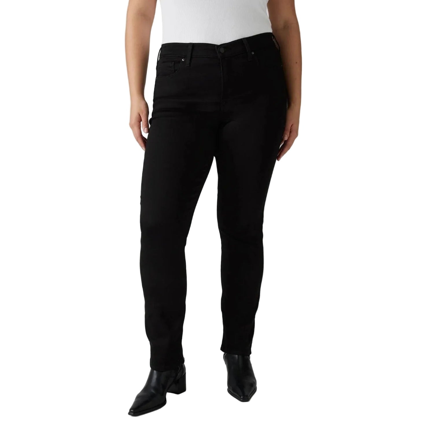 A model wearing black slim-fit jeans with a white top and black pointed-toe ankle boots, shown from the waist down against a white studio background.