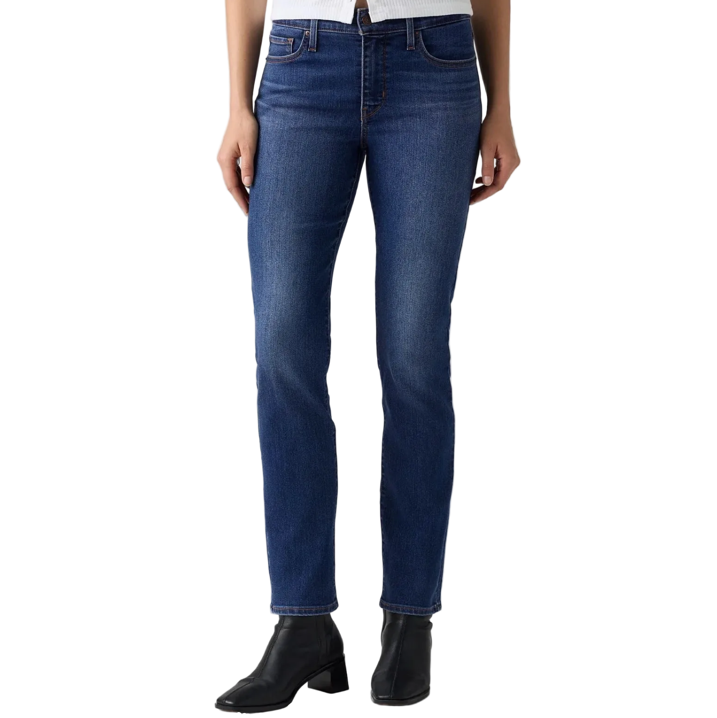 A model wearing a pair of dark blue straight-leg jeans with black ankle boots, shown from the waist down against a white studio background.