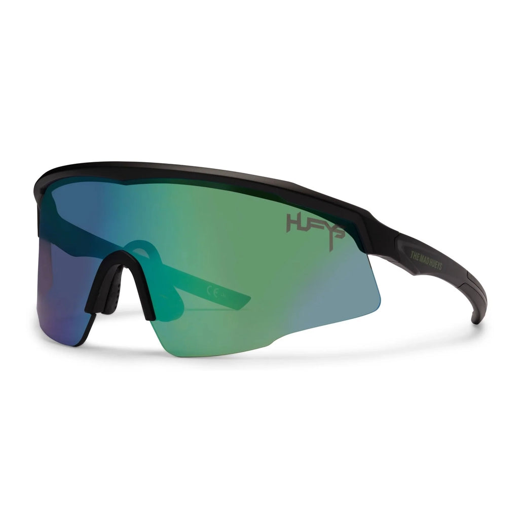 3-4 front view of a pair of Liive Vision Dose Sunglasses (L0805A) with a matte black frame and a large shield-style lens featuring a green mirrored finish, shown on a clean white background.