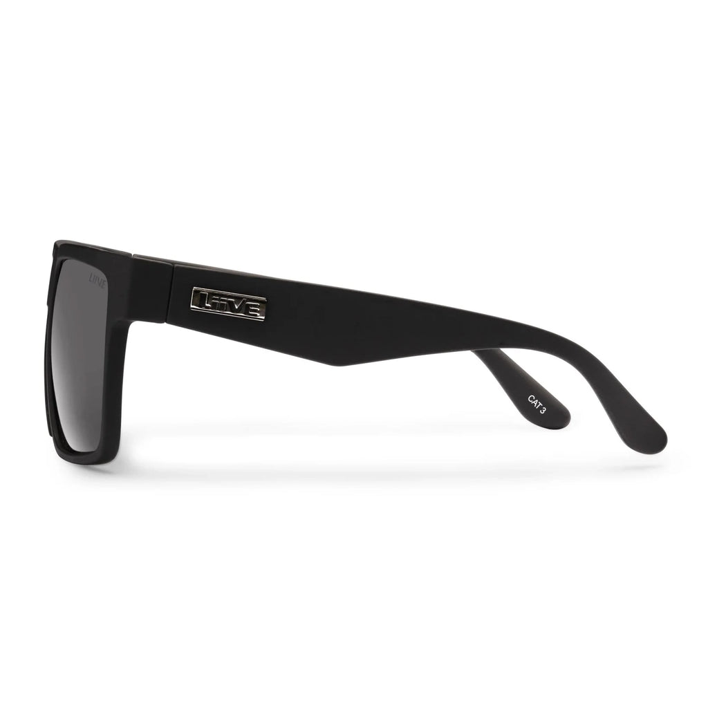 Side view of a pair of matte black Liive Vision Greed Polarised Sunglasses (L0732A) with smoke lenses, featuring the brand name 'LIIVE' printed on the temple and inner lens, on a white background.