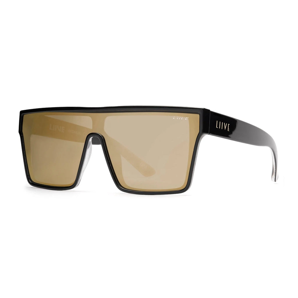 3-4 front view of Black Liive Vision Wasteland Sunglasses (L0828C) with large mirror gold lenses and 'LIIVE' branding on the temple, shown on a white background.