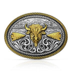 The Montana Silversmiths Attitude Buckle (A1066P) Buffalo showcases an ornate oval design with a gold bull head centerpiece, gold arrowheads, engraved silver Montana Armor background, scrollwork accents, and a twisted gold border.