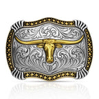 The Montana Silversmiths Attitude Buckle (A1072P) Longhorn features ornate silver scrollwork, a raised gold longhorn bull’s head, and gold accents on the border, all crafted in durable Montana Armor.