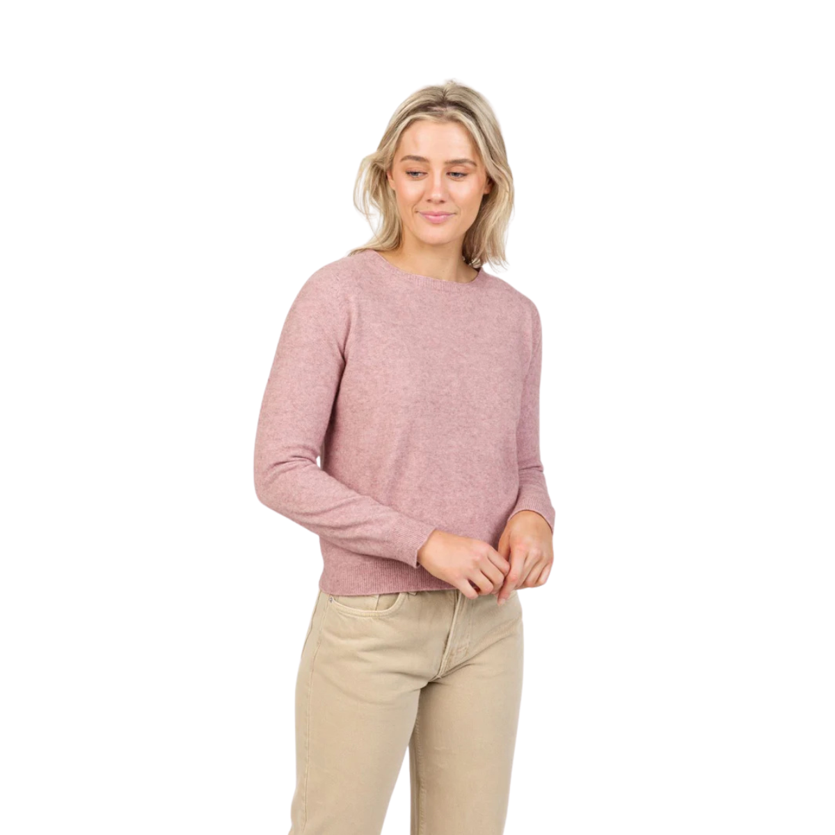 A woman with blonde hair wears the Native World Womens Classic Crop Sweater (NB870) in Lily, paired with beige pants, standing against a white background and looking slightly to the side with a relaxed expression.