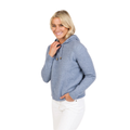 A smiling woman with blonde hair wears the Native World Womens Cropped Hoodie (NB888) in Crystal and white pants, standing with one hand in her pocket against a plain white background.