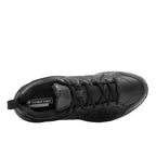 Top view of a black New Balance Men's 608 v5 Slip Resistant Shoes (MX608BB5) shown from the side against a white background.