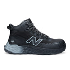 Side view of a black and grey New Balance Men's Cremorne Mid Cut Safety Sneaker (MEFCMCAPBG) with logos on a white background.