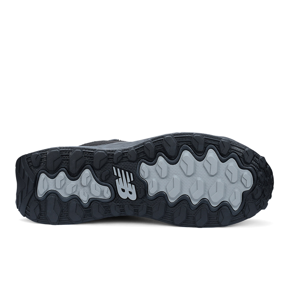 Sole view of a black and grey New Balance Men's Cremorne Mid Cut Safety Sneaker (MEFCMCAPBG) with logos on a white background.