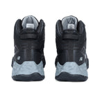 Heel view of a pair of black and grey New Balance Men's Cremorne Mid Cut Safety Sneakers (MEFCMCAPBG) with logos on a white background.