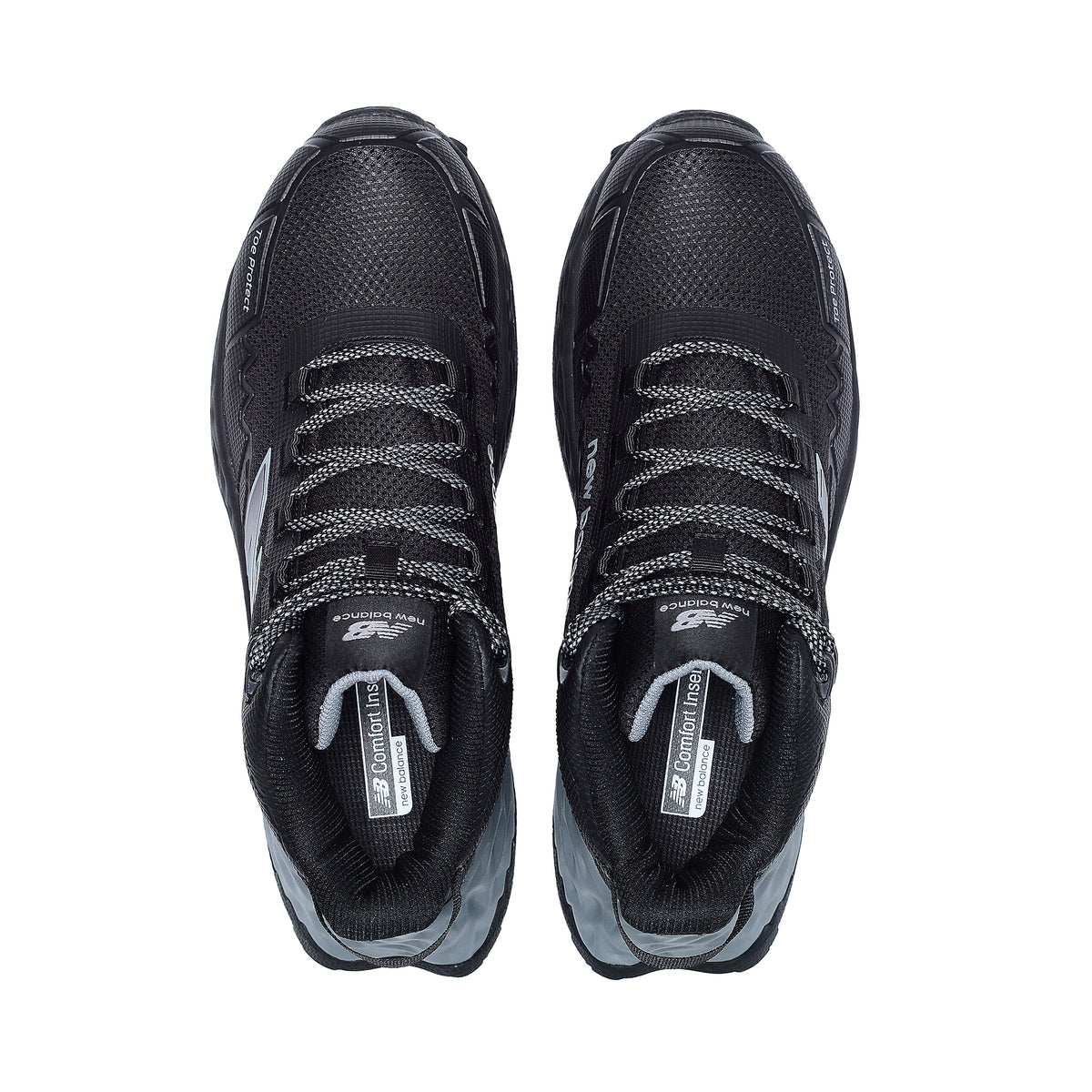 Top view of a pair of black and grey New Balance Men's Cremorne Mid Cut Safety Sneakers (MEFCMCAPBG) with logos on a white background.
