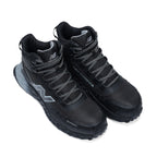 3-4 top view of a pair of black and grey New Balance Men's Cremorne Mid Cut Safety Sneakers (MEFCMCAPBG) with logos on a white background.