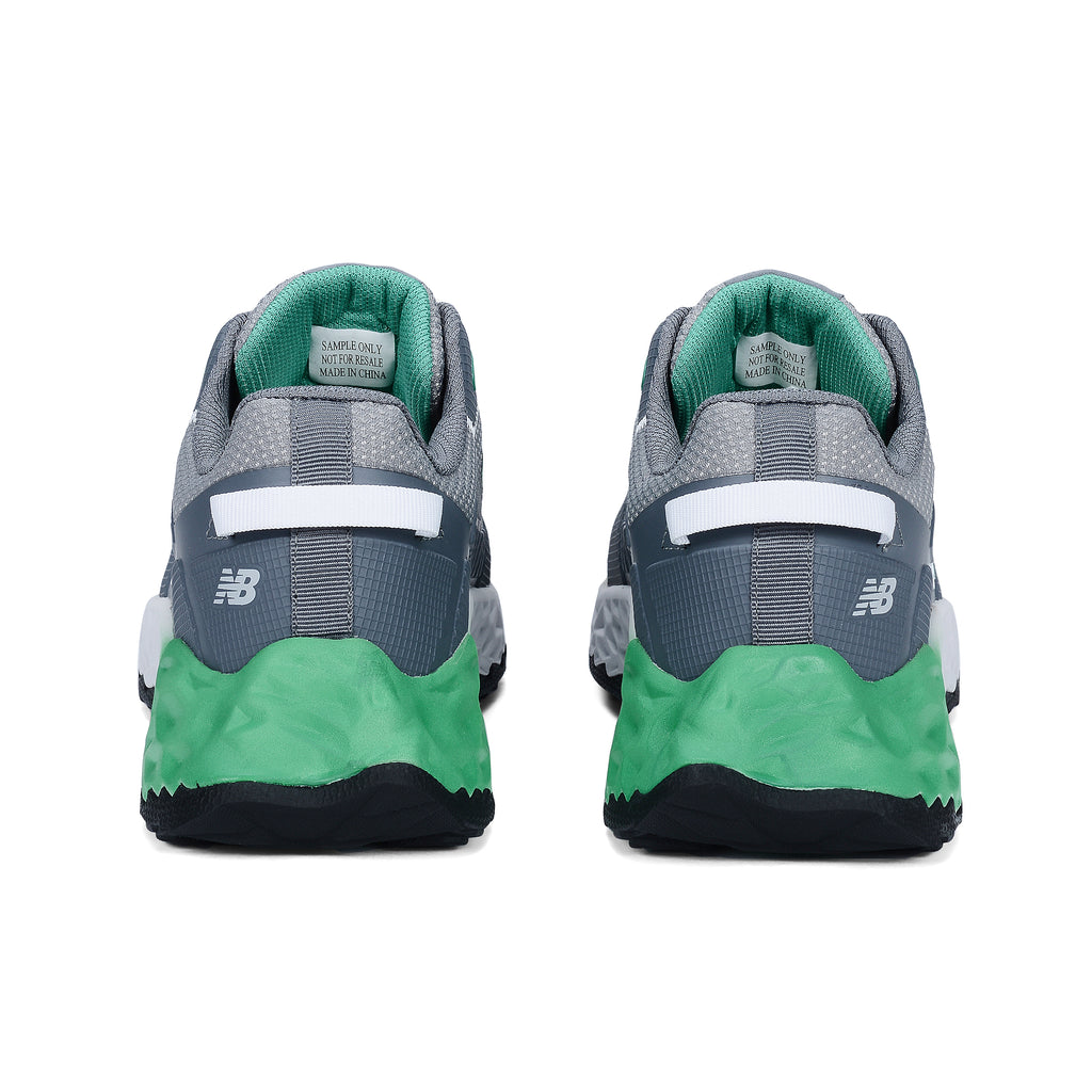 Heel view of a pair of Alloy Green New Balance Men's Cremorne Safety Sneakers (MEFCCAPAG) on a white background.