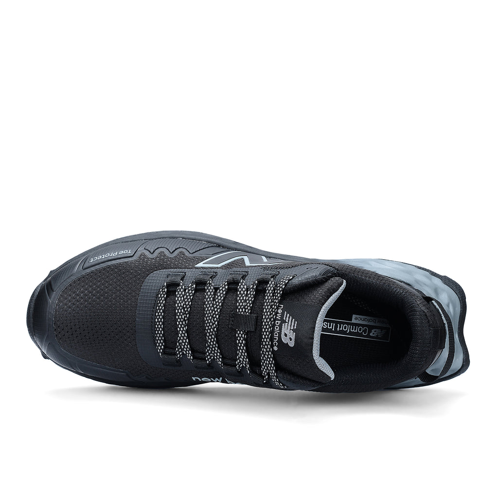 Top view of a black and grey New Balance Men's Cremorne Safety Sneaker (MEFCCAPBG) on a white background.