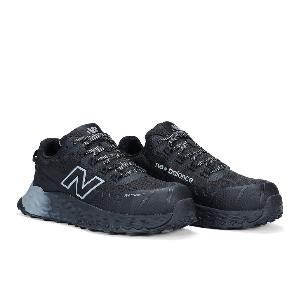 3-4 front view of a pair of black and grey New Balance Men's Cremorne Safety Sneakers (MEFCCAPBG) on a white background.
