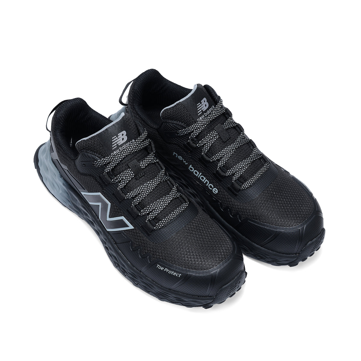 3-4 top view of a pair of black and grey New Balance Men's Cremorne Safety Sneakers (MEFCCAPBG) on a white background.