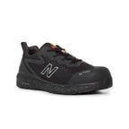 3-4 front view of a black and orange New Balance Men's Logic Composite Toe Sneaker (MIDLOGI) with logo on the side, black laces, and a small orange accent near the tongue, shown against a plain white background.