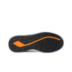 Sole view of a black and orange New Balance Men's Logic Composite Toe Sneaker (MIDLOGI) with logo on the side, black laces, and orange accent on the sole, shown against a plain white background.