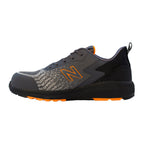 Side view of a grey and orange New Balance Men's Speedware Composite Toe Sneaker (MIDSPWR) with logo detail on a white background.