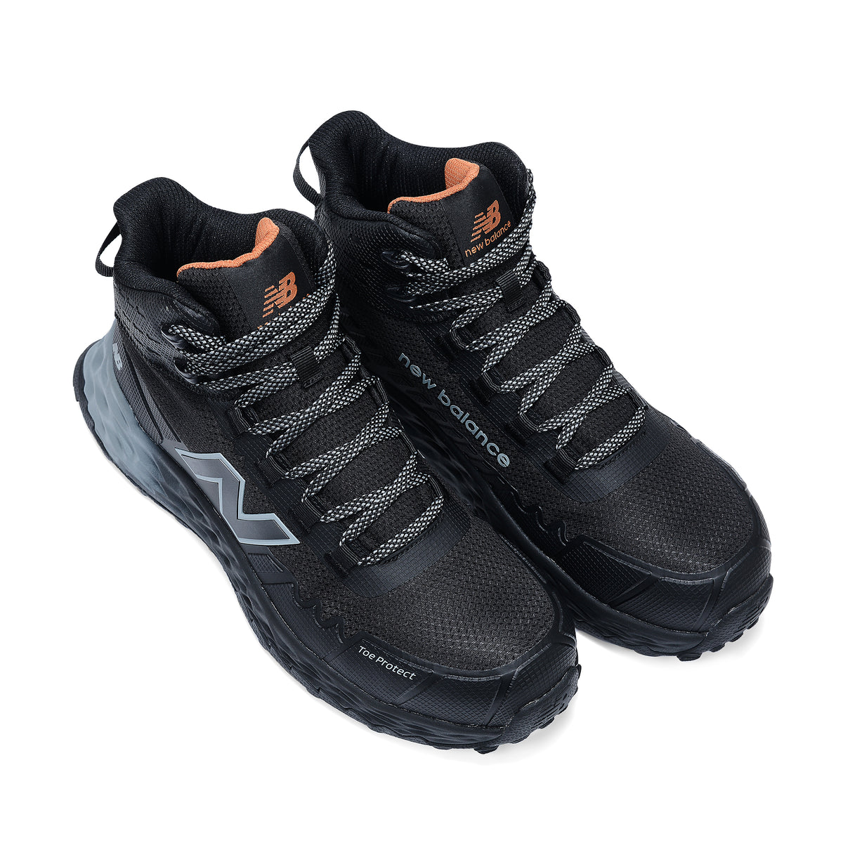 3-4 top view of a pair of black and grey New Balance Women's Cremorne Mid Cut Safety Sneakers (WEFCMCAPBG) with New Balance logos on a white background.
