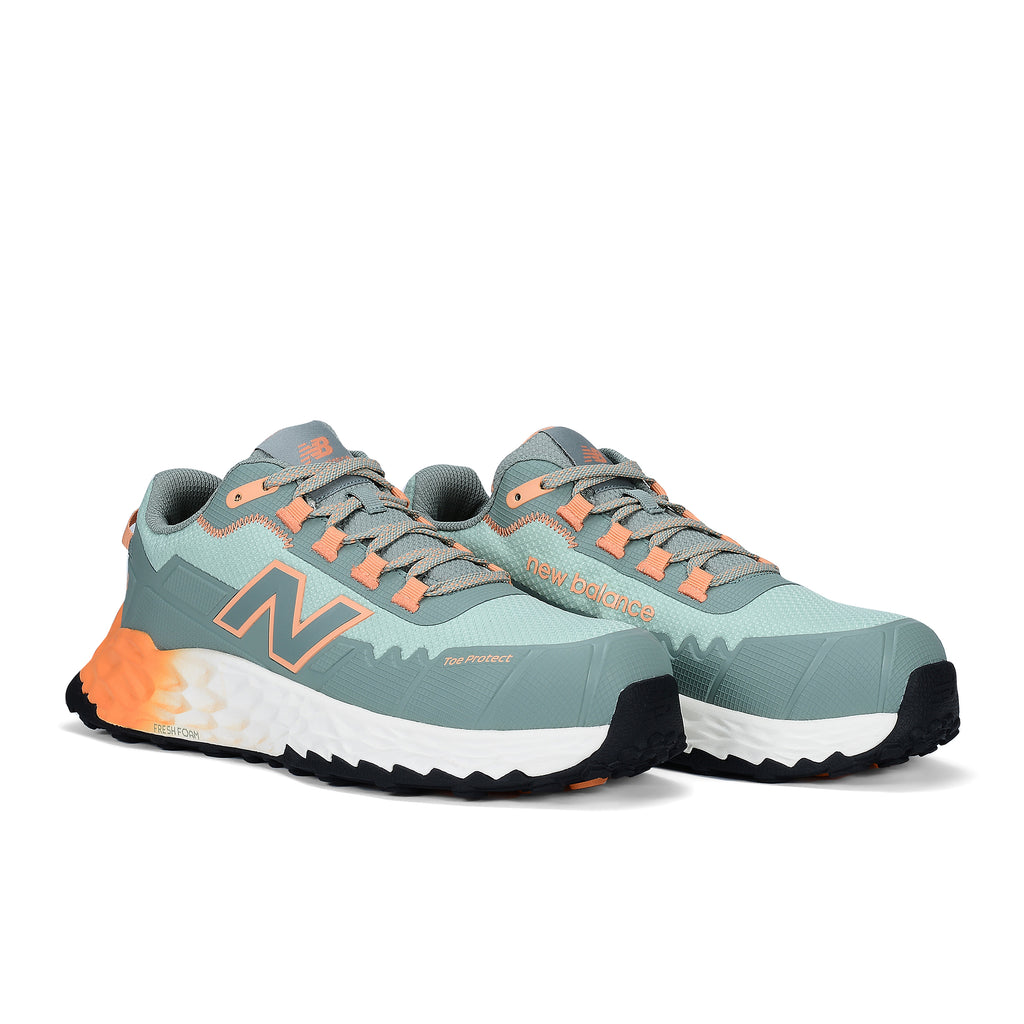 3-4 front view of a pair of aqua and pumpkin New Balance Women's Cremorne Safety Sneaker (WEFCCAPAP) with New Balance logo on a white background.