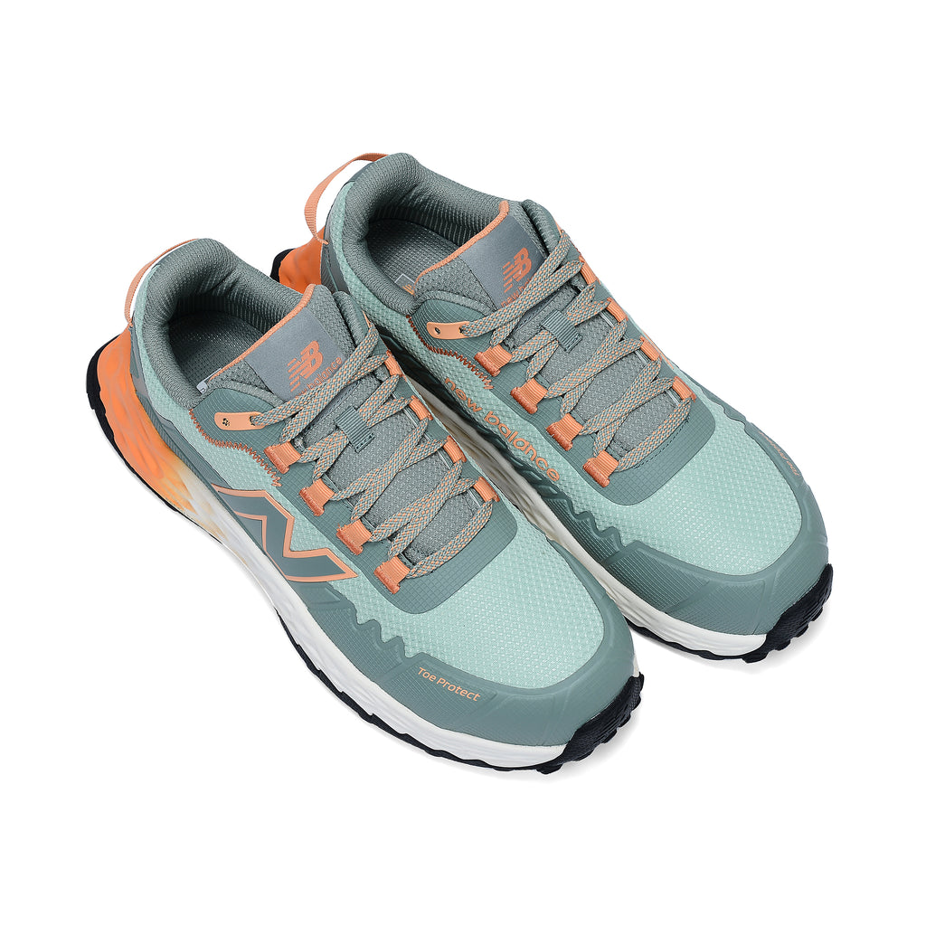 3-4 top view of a pair of aqua and pumpkin New Balance Women's Cremorne Safety Sneaker (WEFCCAPAP) with New Balance logo on a white background.