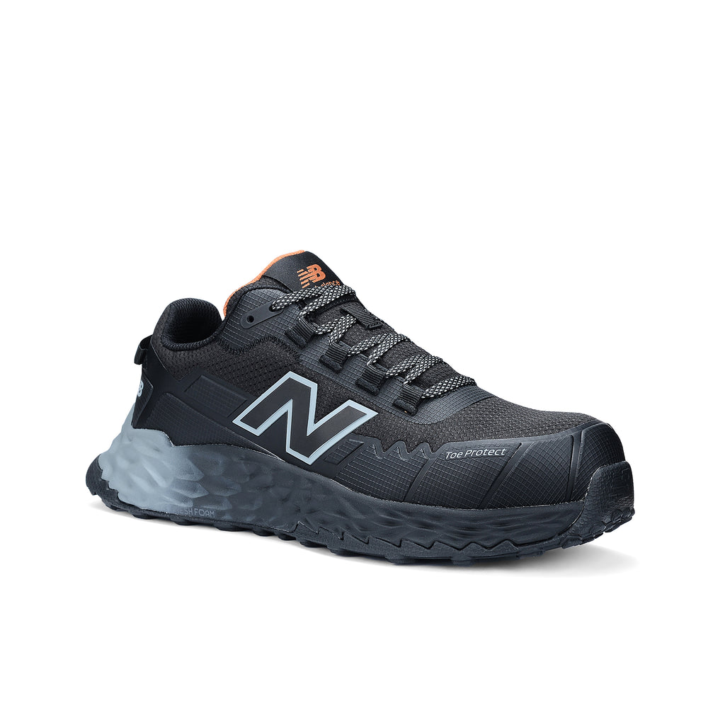 3-4 front view of a black and grey New Balance Women's Cremorne Safety Sneaker (WEFCCAPBG) with New Balance logo on a white background.
