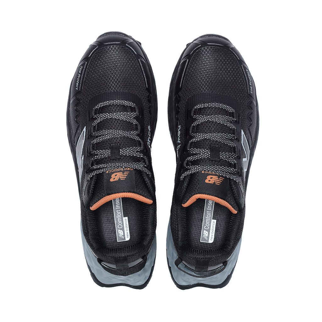 Top view of a pair of black and grey New Balance Women's Cremorne Safety Sneaker (WEFCCAPBG) with New Balance logo on a white background.