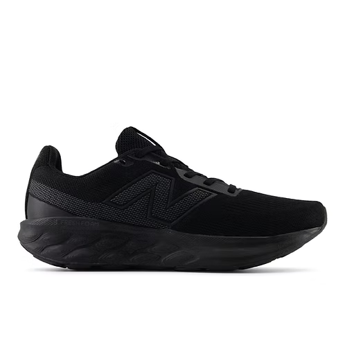 The New Balance Womens Fresh Foam 520 9V Slip Resistant Shoes (W520LT9SR) in black feature a thick, cushioned Fresh Foam sole, a textured "N" logo, and are designed for safety and comfort with slip resistance. Shown in side profile on a white background.