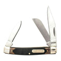 A classic Old Timer 3 Blade Middleman 34OT folding pocket knife with three blades extended, featuring a black and brown handle with a brass 'OLD TIMER' nameplate and SHRADE engraved on the blade.
