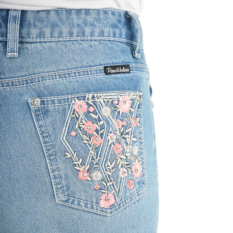 Close up of the back pocket detail of a pair of light blue denim Pure Western High Rise Flora Bootcut Jeans (PCP2213725), against a white background.