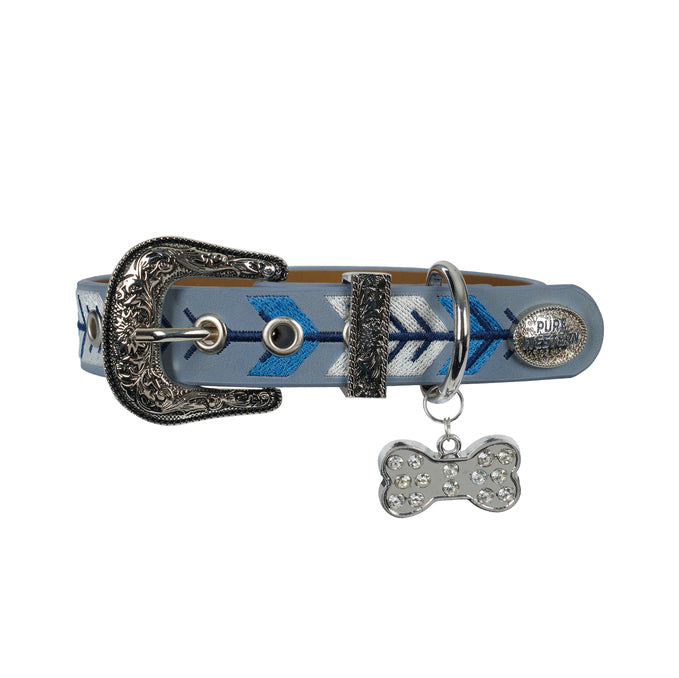 The Pure Western Dogs Kaira Collar (P6W2965CLR) Blue features a light blue strap with blue and white chevron embroidery, metal details, a decorative silver buckle, and a diamanté dog bone tag charm with sparkling rhinestones.