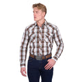 A man wearing the Pure Western Mens Roger L/S Shirt (P6W1100162) in Dark Tan/White stands facing slightly to the side against a white background, paired with blue jeans and a brown belt with a silver buckle.
