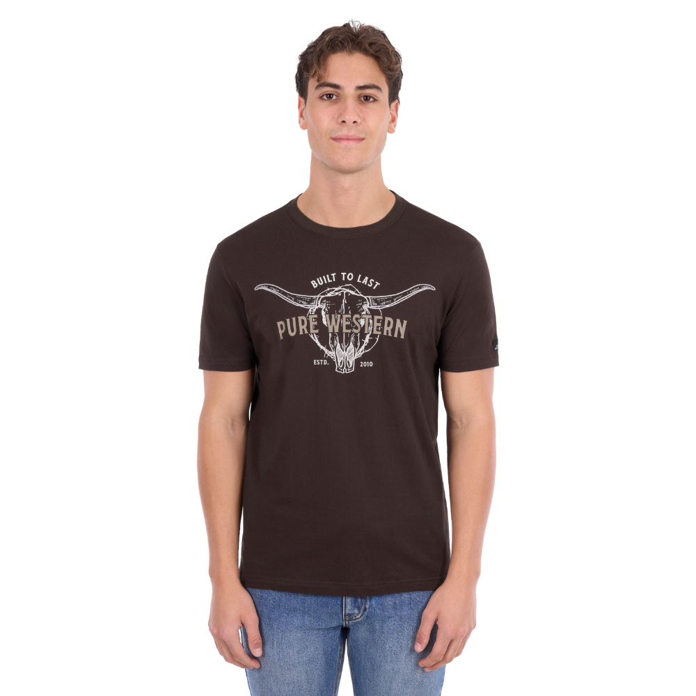 A man wearing a Pure Western Men's Tony Short Sleeve Tee (P6S1503313) in a Chocolate colour with denim jeans.