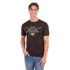 A man wearing a Pure Western Men's Tony Short Sleeve Tee (P6S1503313) in a Chocolate colour with denim jeans.