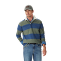A man wearing an R.M.Williams Mens Jones Stripe Rugby (KR200RJ16) in Ensign Blue, a gray cap, and blue jeans stands with one hand in his pocket against a plain white background.