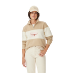 A woman in a beige cap, light jeans, and an R.M.Williams Womens Trickett Panel Sweatshirt (KZR00BB01) Sand stands against a plain white background.