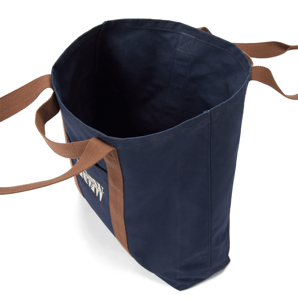 Inside view of a navy R.M.Williams Heritage Tote (CGM9OCA04) with brown handles and RMW logo on a white background.
