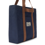 Navy R.M.Williams Heritage Tote (CGM9OCA04) with brown handles and RMW logo on a white background.