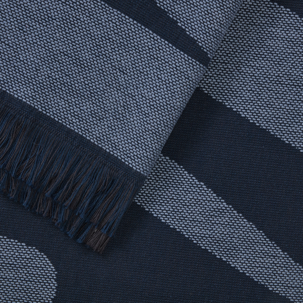 Folded navy and blue vintage R.M.Williams Longhorn Towel (LSLCOCO02) on a white background.