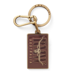 R.M.Williams Men's Heritage Logo Enamel Keyring (CKS4AMT01) with a brass clasp and a brown enamel tag featuring 'R.M. Williams Australia' on a white background.