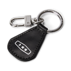 Black leather R.M.Williams Men's RMW Keyfob (CKS4MLE03) with a metal ring and snap on a white background.