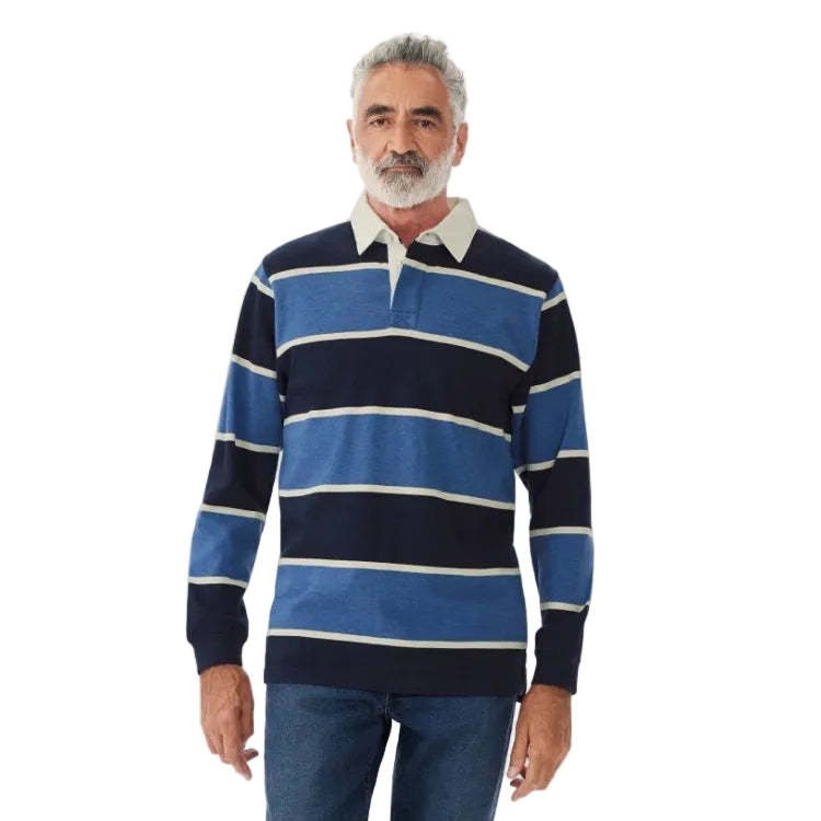 A man wearing a blue, navy and white striped R.M.Williams Men's Tweedale Rugby (KR200JSFW01) on a white background.